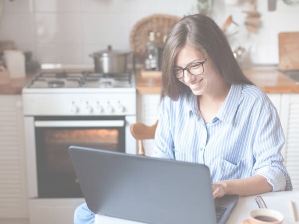 Photo of woman working from home
